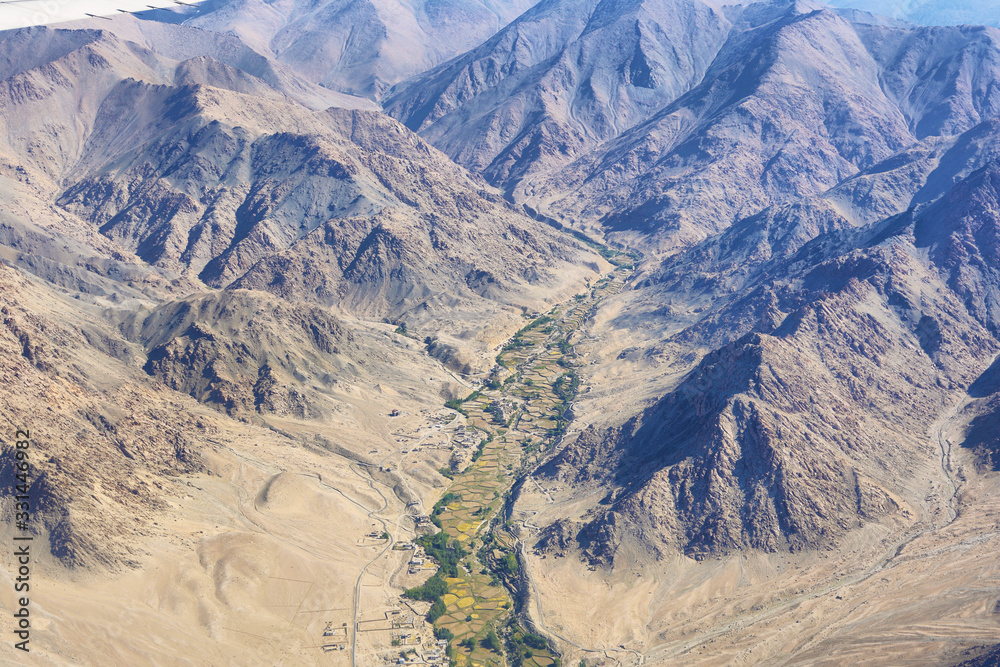 Aerial view of Ladakh region from the airplane window, India.