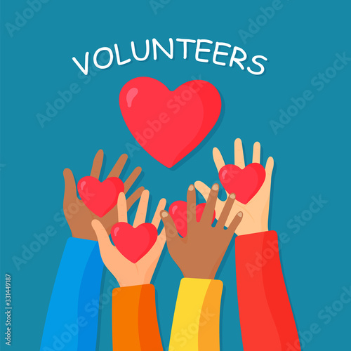 Hands of volunteers.