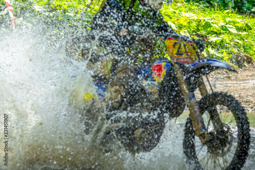 Motorcycle Enduro and Lots of Water Spray