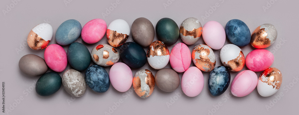 Pattern of pink and blue eggs on a gray background. Pattern of pink and blue eggs on a gray background.
