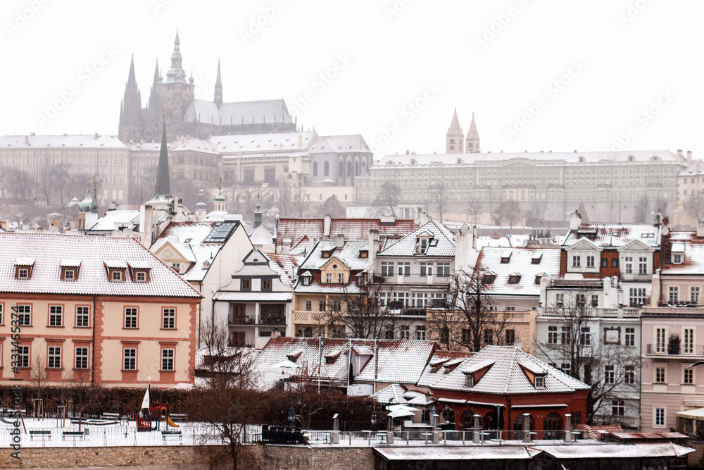 Prague old buildings in the snow