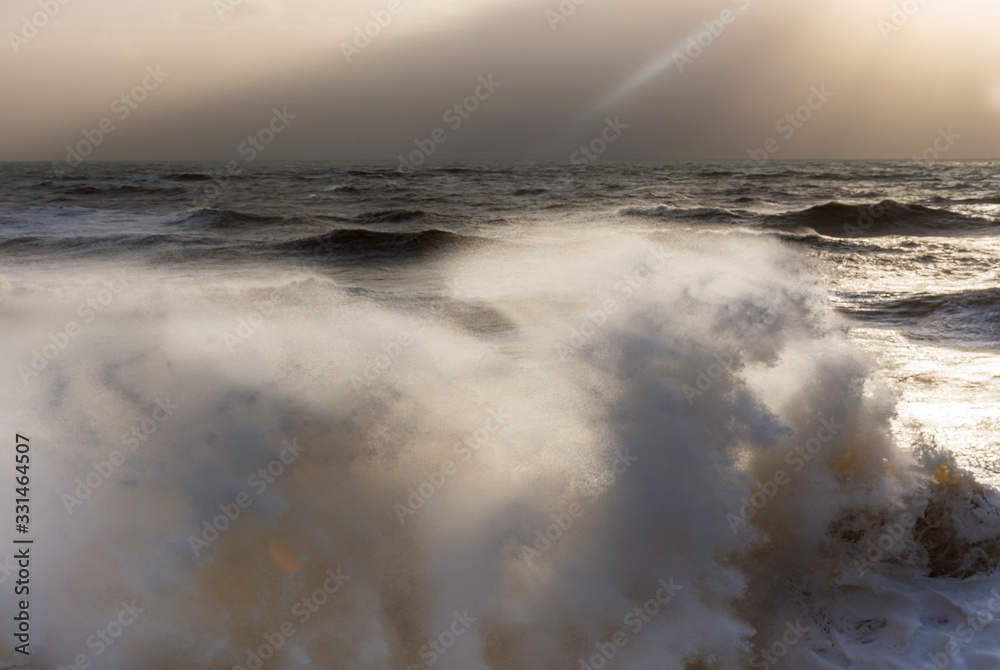 Storm at sea, storm warning on the coast. Thunderclouds and big sea waves during a storm. - image. Storm on the black sea in Crimea Storm at sea, storm warning on the coast. Thunderclouds and big sea waves during a storm. - image. Storm on the black sea in Crimea