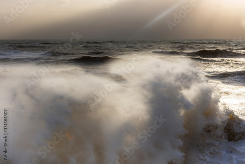 Storm at sea, storm warning on the coast. Thunderclouds and big sea waves during a storm. - image. Storm on the black sea in Crimea