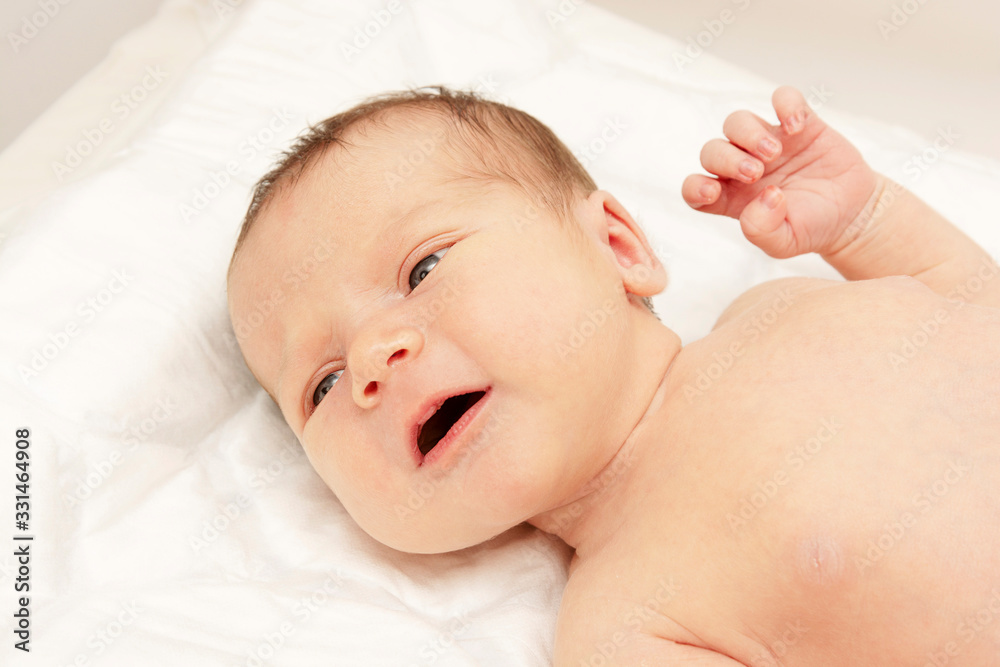 Portrait of a beautiful sleeping new born baby. Health care, motherhood. Portrait of a beautiful sleeping new born baby. Health care, motherhood.