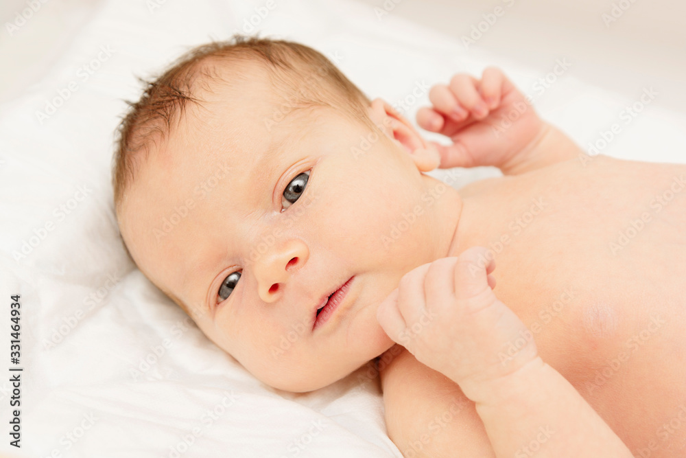 Portrait of a beautiful sleeping new born baby. Health care, motherhood. Portrait of a beautiful sleeping new born baby. Health care, motherhood.