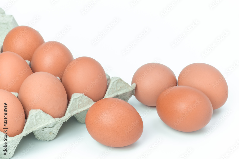 Chicken eggs in box on white background Chicken eggs in box on white background