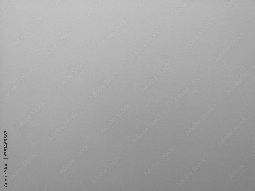 surface of the cement wall is rough, paint light gray color in texture material concrete background surface of the cement wall is rough, paint light gray color in texture material concrete background