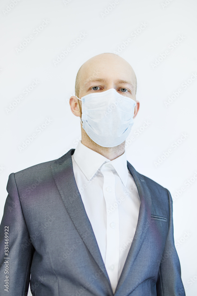 image of business man wearing anti bacterial mask against virus and pollution image of business man wearing anti bacterial mask against virus and pollution