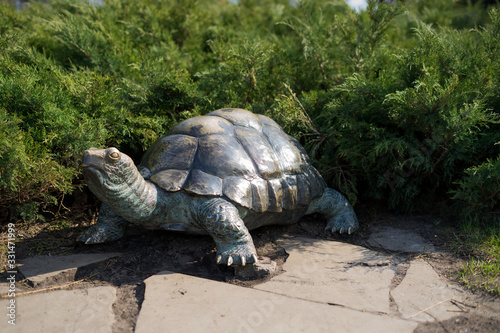 Turtle, a statue to decorate the yard. Bronze Turtle. Garden figure turtle