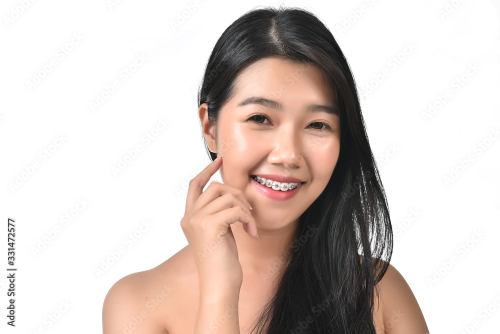 Asian woman poses for healthy skin beauty in white isolated background. Cosmetic, skincare, surgery concept with copy space. Her skin and face are healthy, beautiful, fresh and youthful. Asian woman poses for healthy skin beauty in white isolated background. Cosmetic, skincare, surgery concept with copy space. Her skin and face are healthy, beautiful, fresh and youthful.