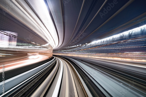 Motion blur of train moving inside tunnel with daylight in tokyo  Japan.