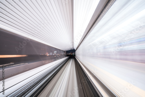 Motion blur of train moving inside tunnel with daylight in tokyo  Japan.