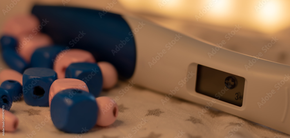 Naklejka premium pregnancy test with pink and blue objects