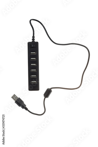 Black USB hub with six ports, isolated on white