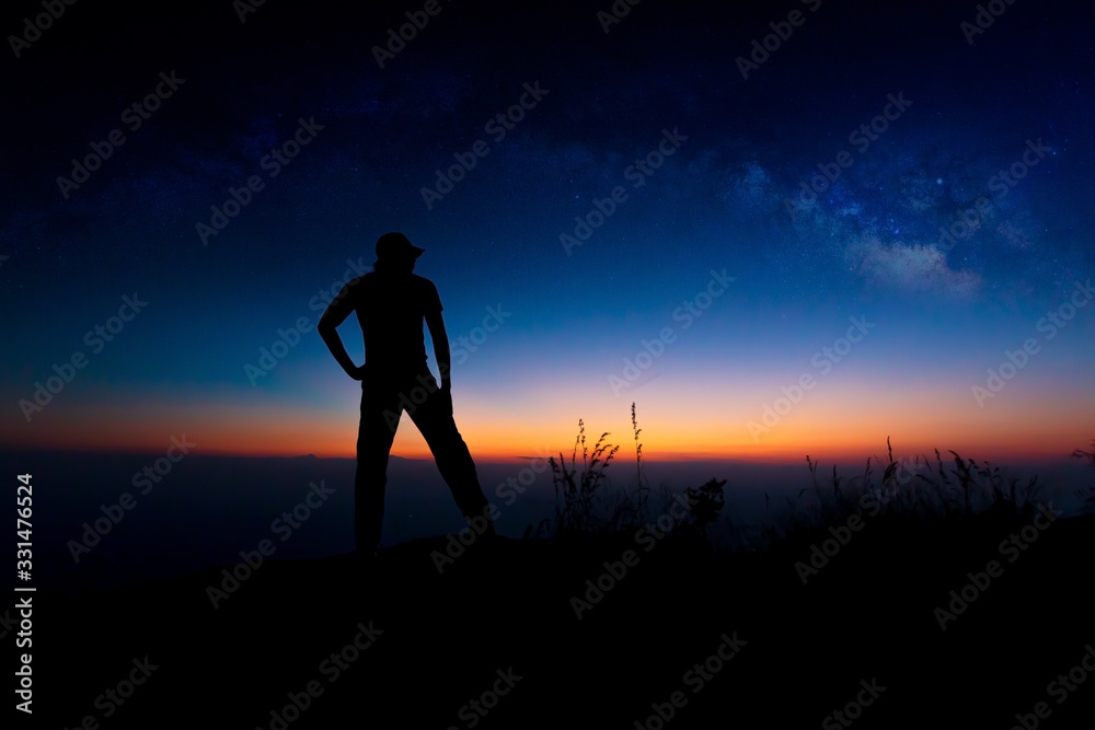Landscape with Milky Way. Night sky with stars and silhouette of a standing happy man on the mountain,Outer Space, Star - Space, Milky Way, Night, Mountain Climbing 