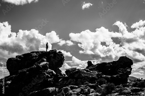 man on top of rock