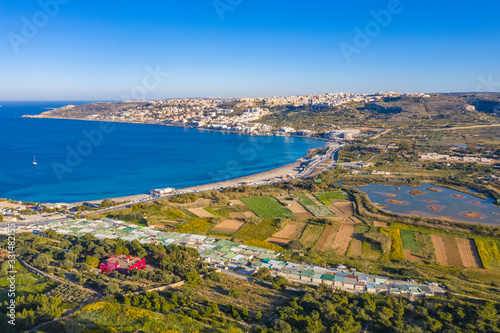 Aerial landscape view of the famous maltese beach, bay. Mediterranean sea. Mellieha city. Europe. Malta