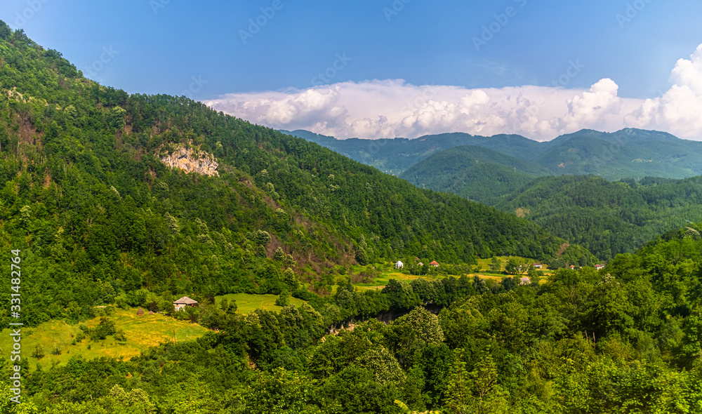 Mountain landscape with rare rural houses in Montenegro
