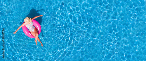 Slika na platnu Zenith aerial view of a swimming pool in summer