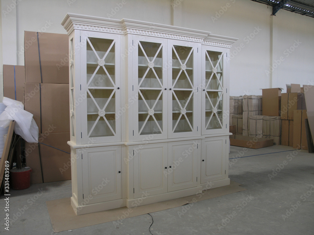 Fototapeta premium Classy and Modern Luxury Wooden Storage Furniture for Home Interiors Furniture in Factory Isolated Background