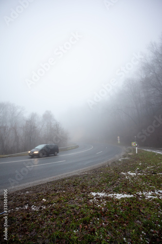 Moving car on highway with fog © Csák István