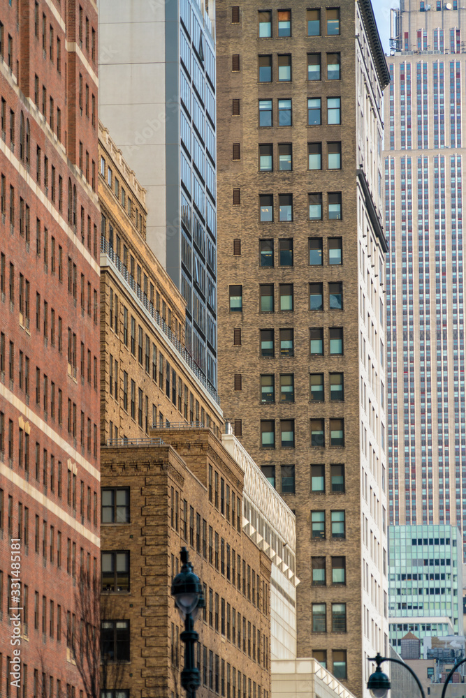 Fototapeta premium The ever changing yuxtaposition of styles through the ages in New York City, USA