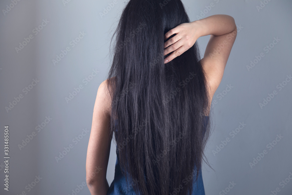 Fototapeta premium woman touching in long hair