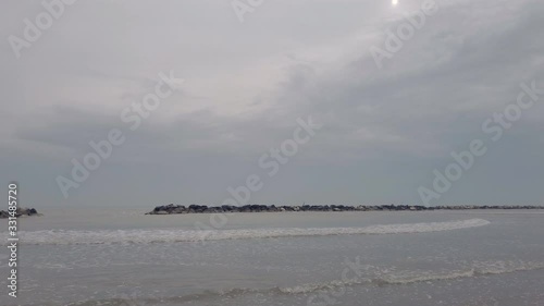 walking on seaside in a cold winter day