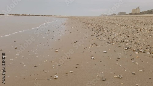 walking on seaside in a cold winter day