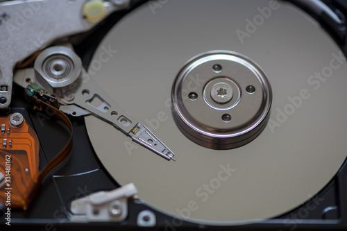 Close-up on three disk drives, hard disk, solid state, SATA, IDE