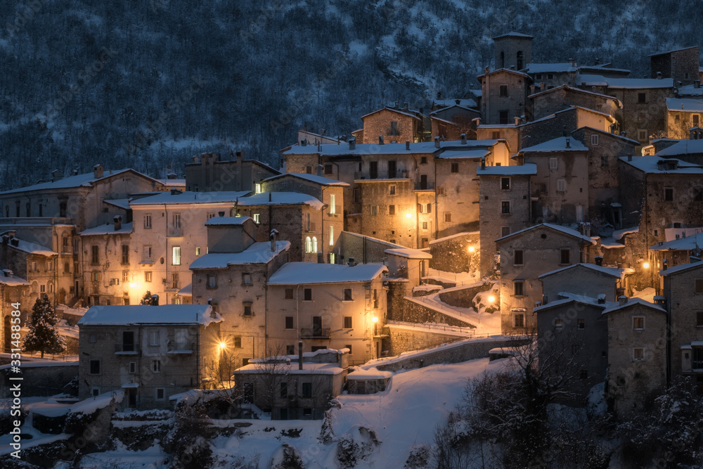 Ancient village at the blue winter hour.