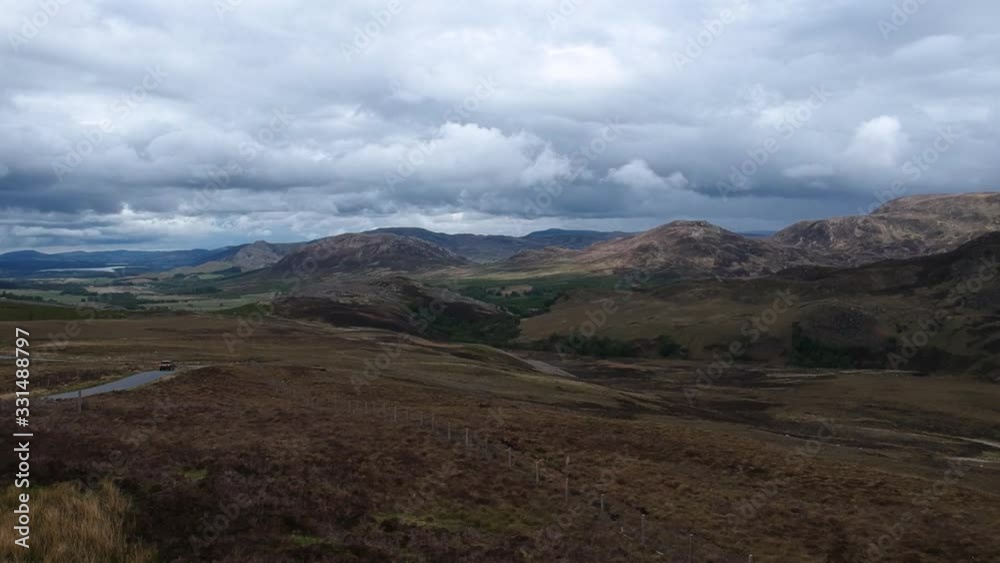 Revealing tilt-up drone shot scottish highland mountain Revealing tilt-up drone shot scottish highland mountain