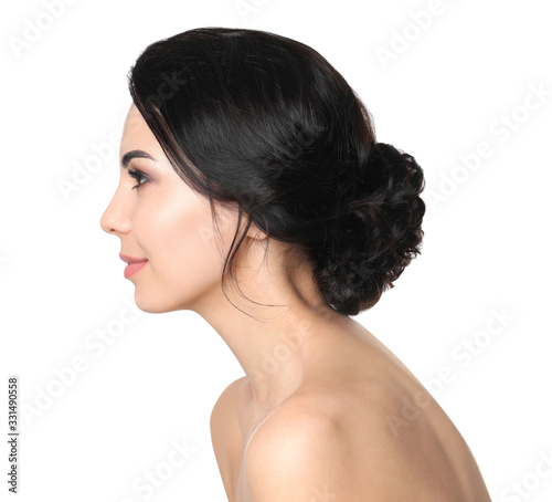 Portrait of young woman with beautiful hair on white background