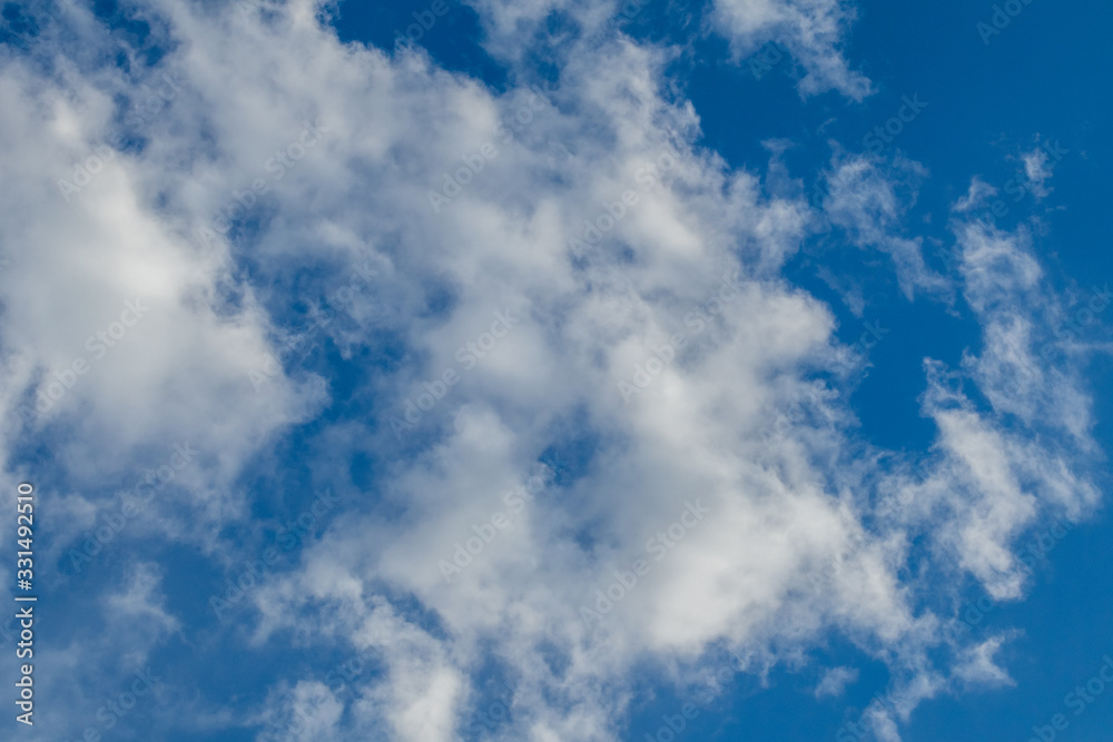 Bright blue sky white clouds texture background Bright blue sky white clouds texture background