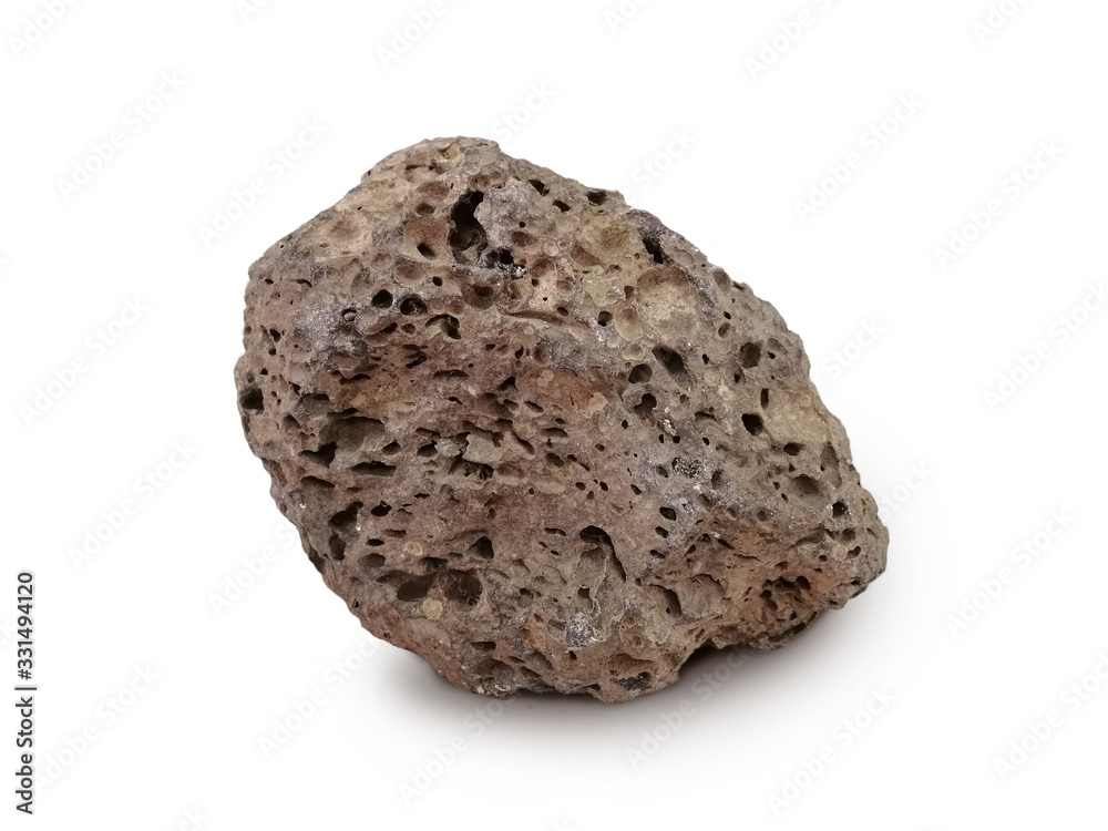 Basait stone isolated on white background. Basalt is a dark-colored, fine-grained, igneous rock composed mainly of plagioclase and pyroxene minerals. It most commonly forms as an extrusive rock, Basait stone isolated on white background. Basalt is a dark-colored, fine-grained, igneous rock composed mainly of plagioclase and pyroxene minerals. It most commonly forms as an extrusive rock,