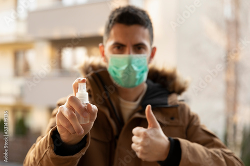 Man wearing hygienic mask to prevent the virus PM2.5 and Coronavirus.