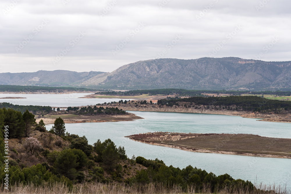 Buendia reservoir with turquoise waters in spring. La Alcarria region, Spain