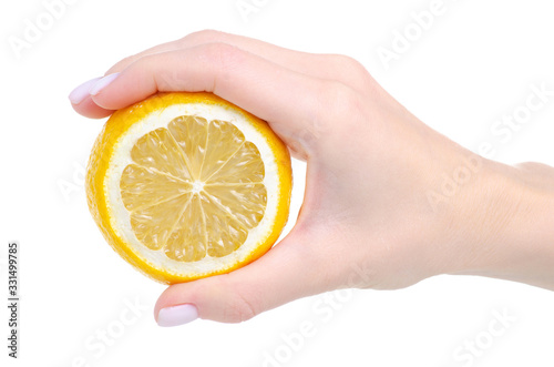 Half of lemon in hand on white background isolation