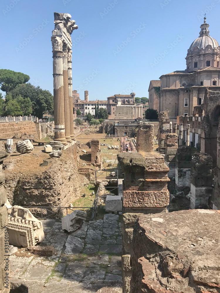 Panorama of the millennium ruins of the eternal city, along with sophisticated architectural compositions of Catholic cathedrals.