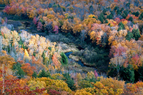 View of the Carp River Valley and autumn colors from the Lake of the Clouds Scenic Overlook, Porcupine Mountains Wilderness State Park, Michigan. 