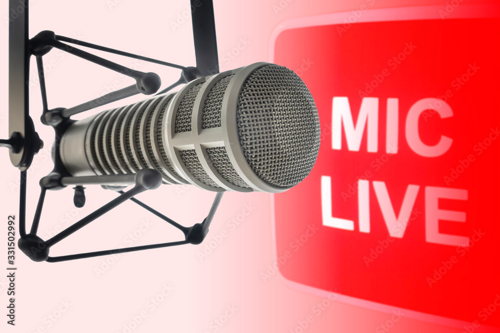 Professional microphone in radio station studio on air Photos | Adobe Stock