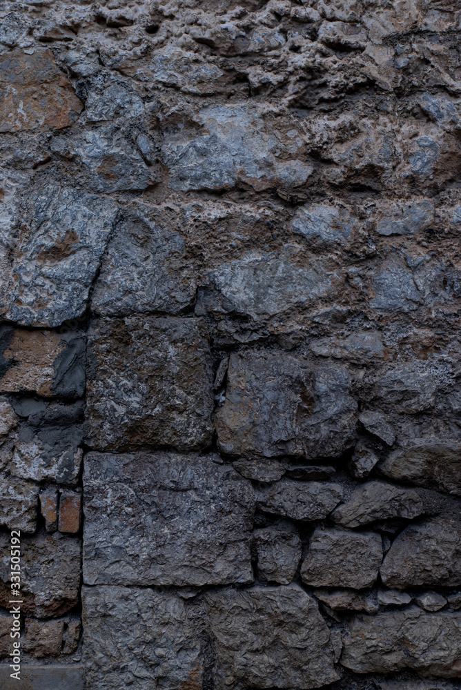 Texture of stone wall made of grey stones Texture of stone wall made of grey stones