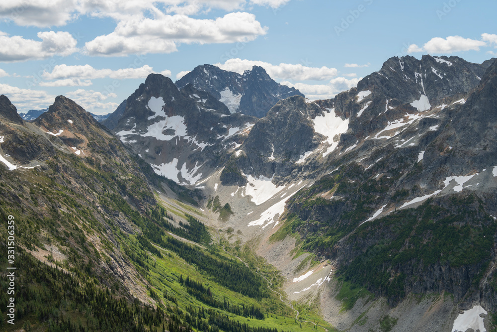 Upper Fisher Creek basin. Fisher Peak. Black Peak and Mount Arriva are in the distance. North Cascades National Park Washington. Washington. United States Upper Fisher Creek basin. Fisher Peak. Black Peak and Mount Arriva are in the distance. North Cascades National Park Washington. Washington. United States