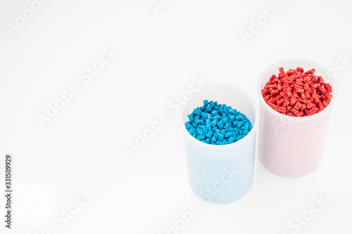 Plastic granules close up for holding,Colorful plastic granules with white background. and dollar money,Plastic Business,Plastic industry.