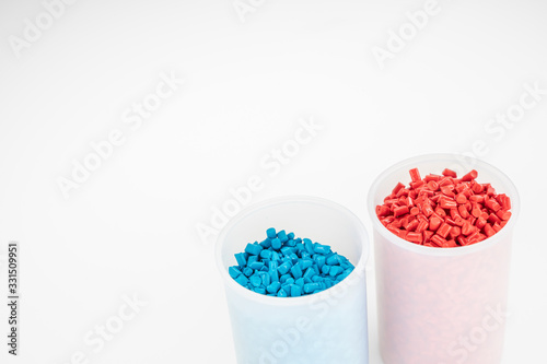 Plastic granules close up for holding Colorful plastic granules with white background. and dollar money Plastic Business Plastic industry.