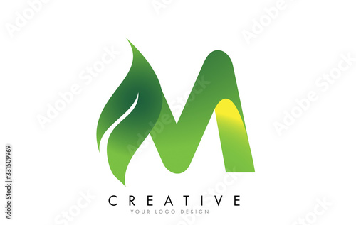 Letter M with eco leaf concept design.