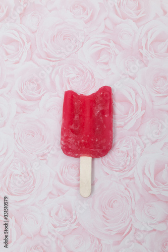 Tasty and refreshing strawberry flavored popsicle.