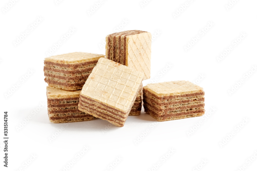 Heap of square wafer biscuits isolated on white background Heap of square wafer biscuits isolated on white background