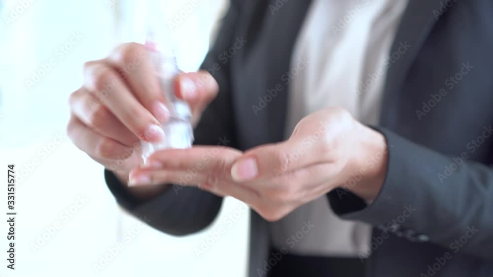 Female using alcohol gel to washing hands , using alcohol gel clean wash hand antiviral bacteria and avoid infections, virus corona concept Female using alcohol gel to washing hands , using alcohol gel clean wash hand antiviral bacteria and avoid infections, virus corona concept