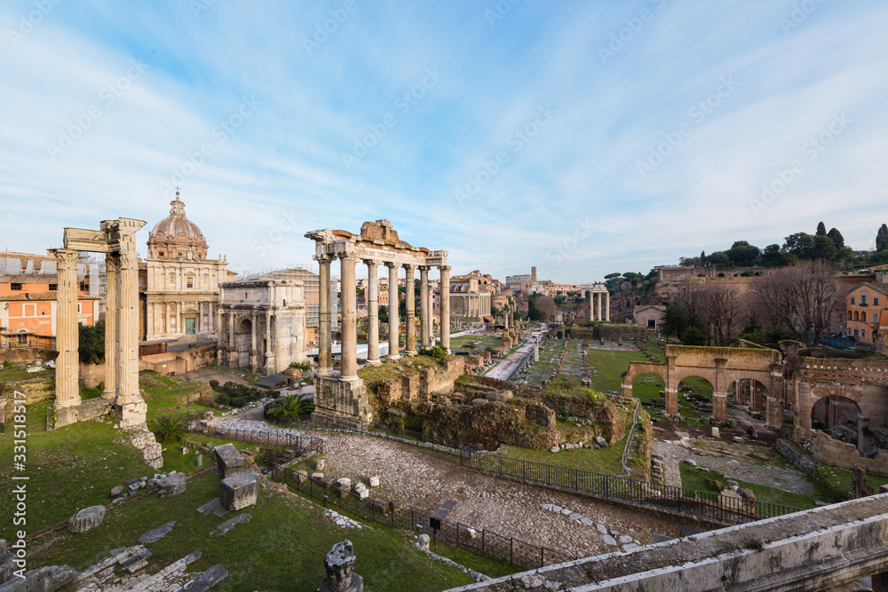 Ruins of the Roman Forum at dusk in Rome, Italy